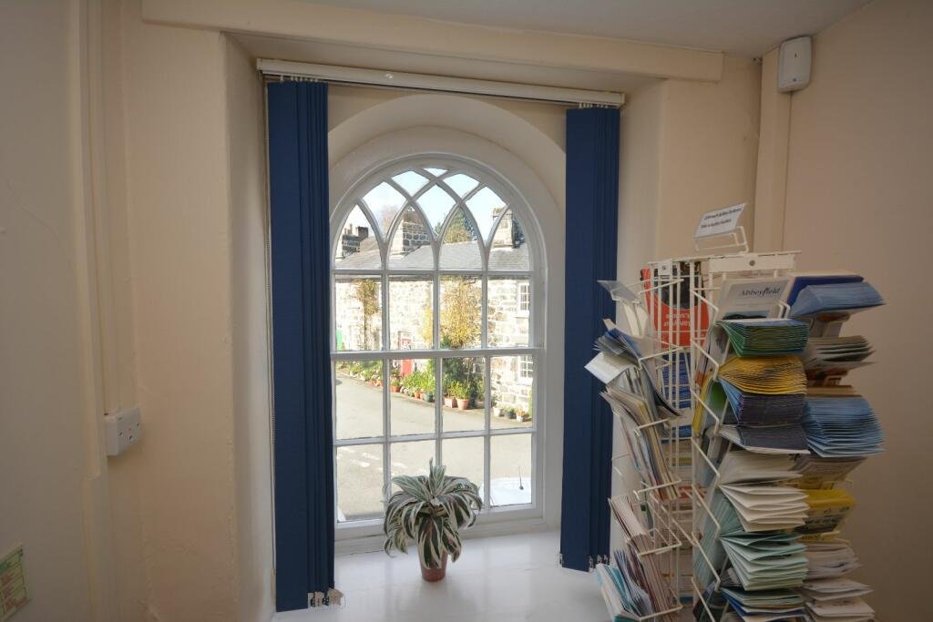 A former police station in Dolgellau with four original cells and three courtyards is on the market for £95,000, offering quirky charm and conversion potential.
