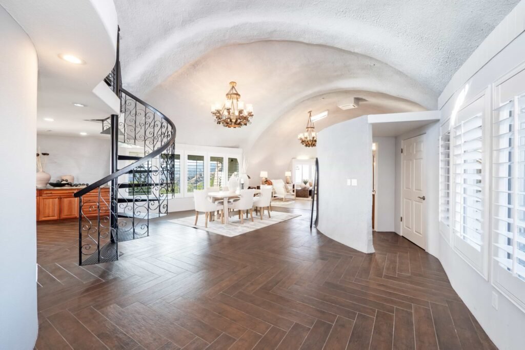 A $3 million California mountain home resembling The Flintstones’ Bedrock is up for sale, featuring domed architecture, a rock-carved pool, and breathtaking panoramic views.