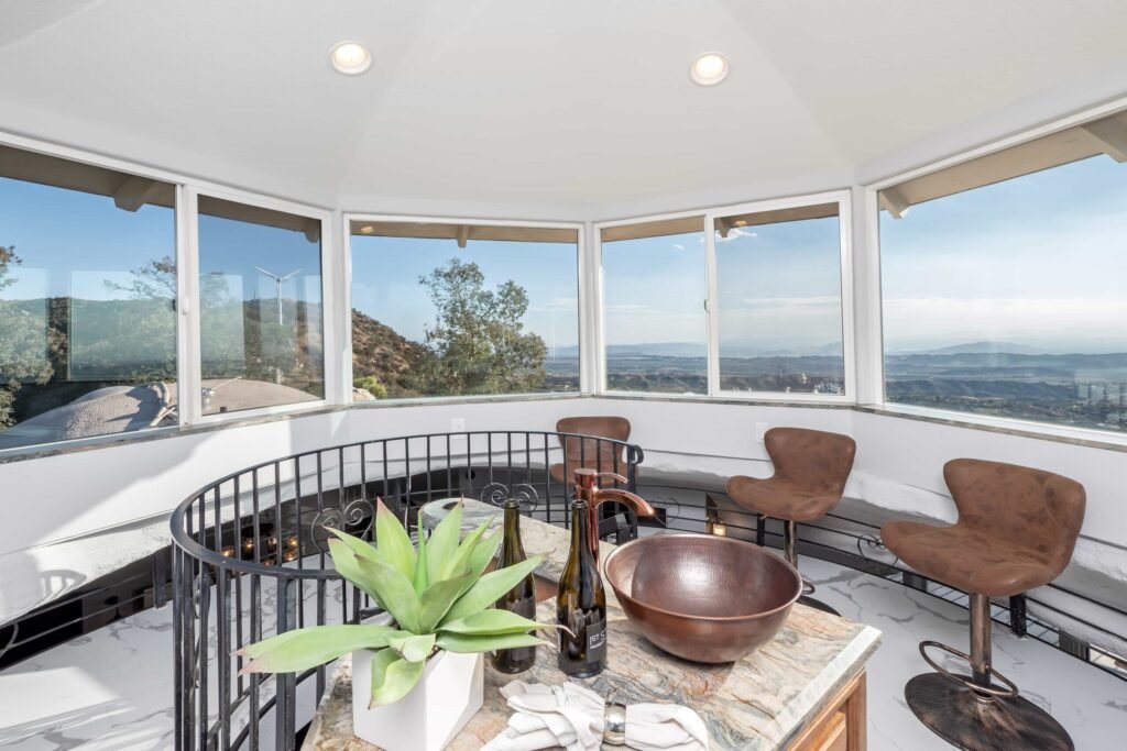 A $3 million California mountain home resembling The Flintstones’ Bedrock is up for sale, featuring domed architecture, a rock-carved pool, and breathtaking panoramic views.