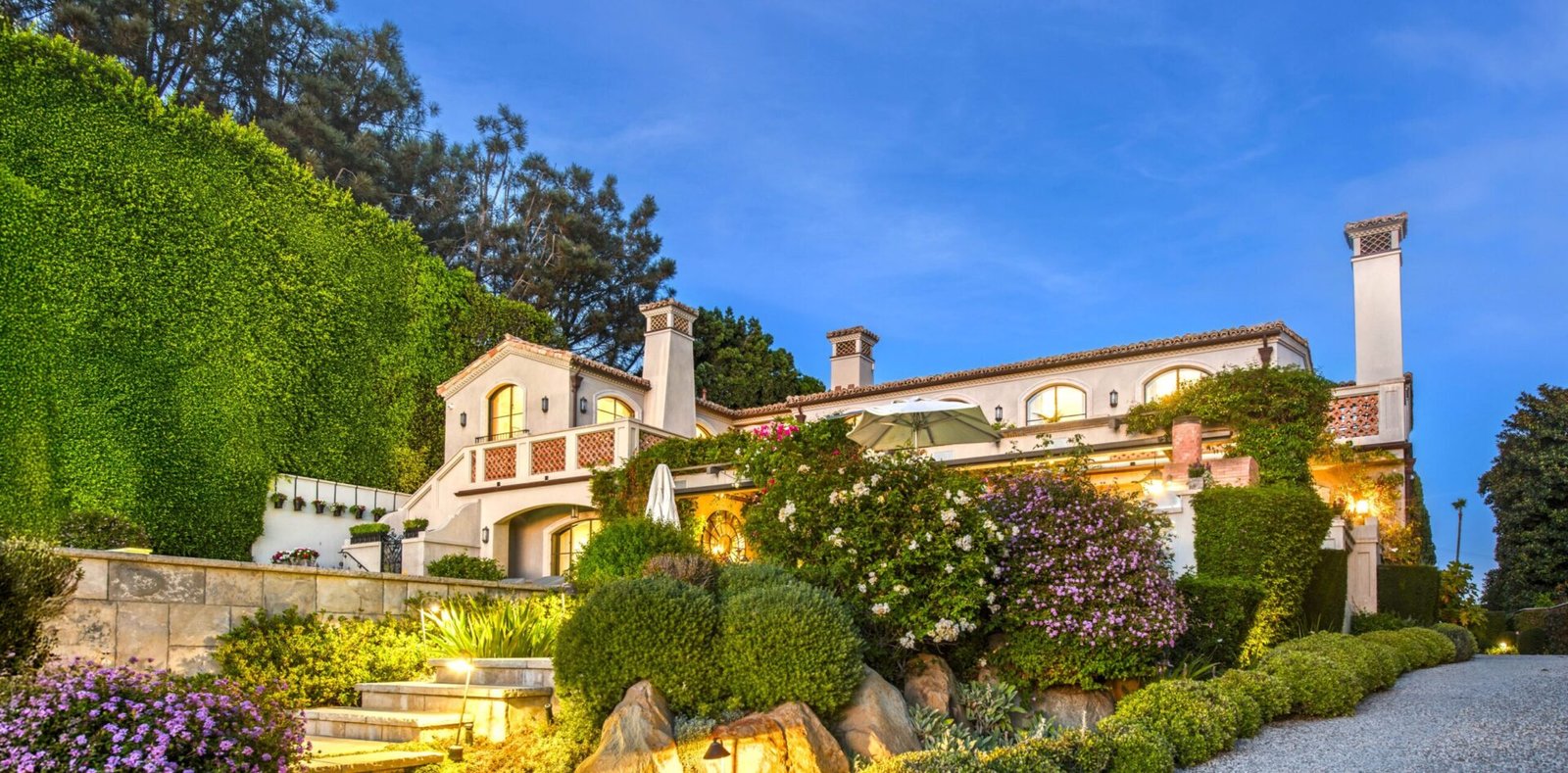 A $29.9m Malibu mansion in the exclusive Serra Retreat offers ocean views, Italianate gardens, a tennis court, infinity pool, guest house, and timeless European elegance.