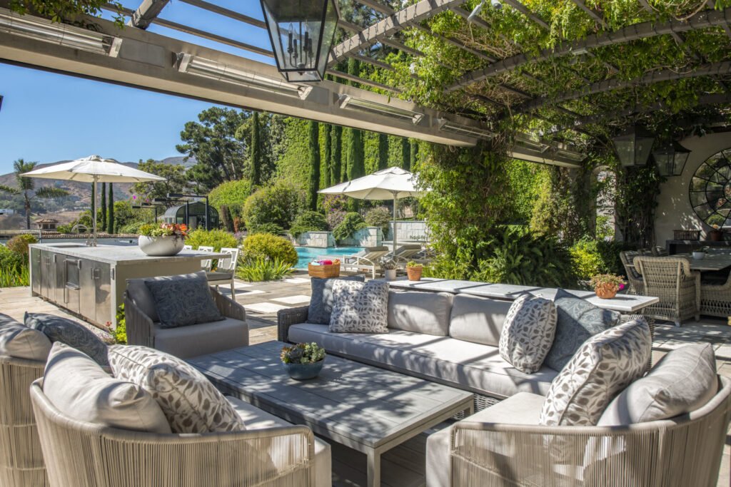 A $29.9m Malibu mansion in the exclusive Serra Retreat offers ocean views, Italianate gardens, a tennis court, infinity pool, guest house, and timeless European elegance.