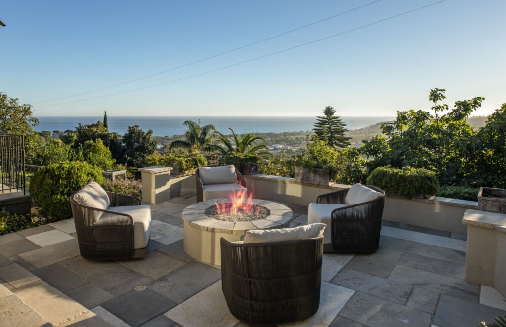 A $29.9m Malibu mansion in the exclusive Serra Retreat offers ocean views, Italianate gardens, a tennis court, infinity pool, guest house, and timeless European elegance.