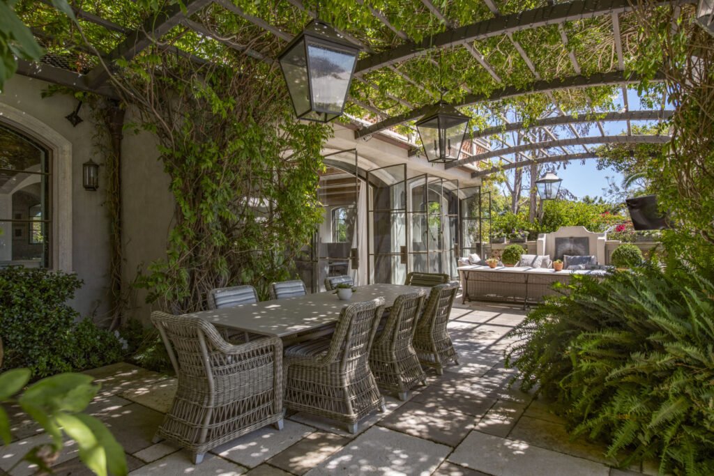 A $29.9m Malibu mansion in the exclusive Serra Retreat offers ocean views, Italianate gardens, a tennis court, infinity pool, guest house, and timeless European elegance.