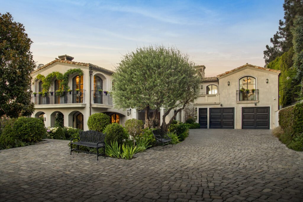 A $29.9m Malibu mansion in the exclusive Serra Retreat offers ocean views, Italianate gardens, a tennis court, infinity pool, guest house, and timeless European elegance.