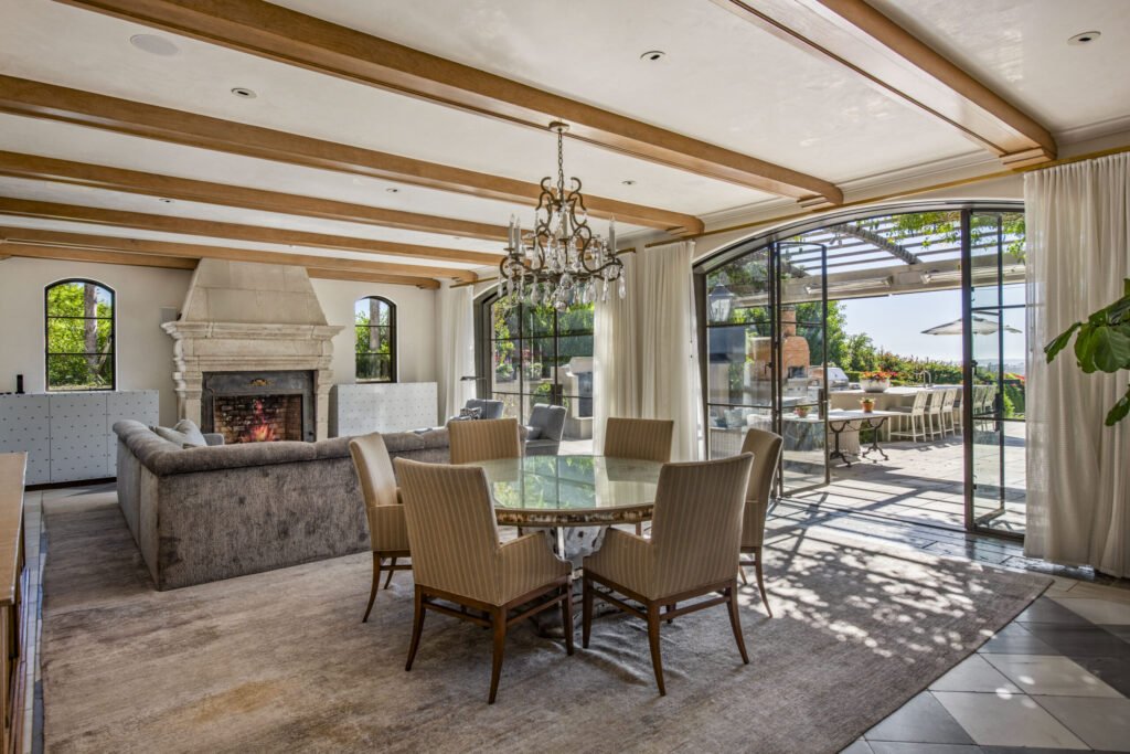 A $29.9m Malibu mansion in the exclusive Serra Retreat offers ocean views, Italianate gardens, a tennis court, infinity pool, guest house, and timeless European elegance.