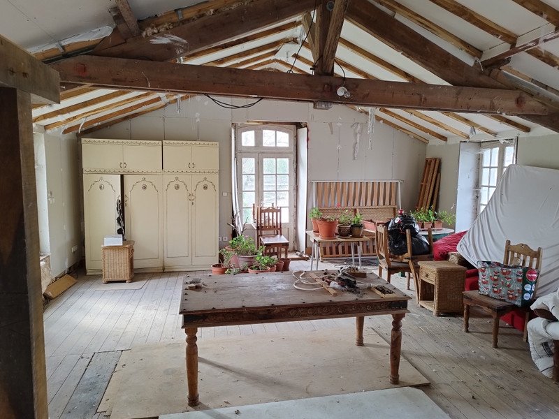 An enchanting private island chateau near Toulouse is for sale for £653,572, featuring 12 rooms, a riverside terrace, a pub, olive grove, and conversion potential.