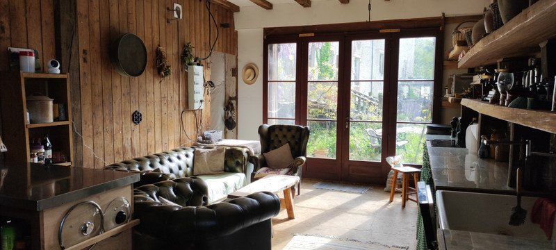 An enchanting private island chateau near Toulouse is for sale for £653,572, featuring 12 rooms, a riverside terrace, a pub, olive grove, and conversion potential.