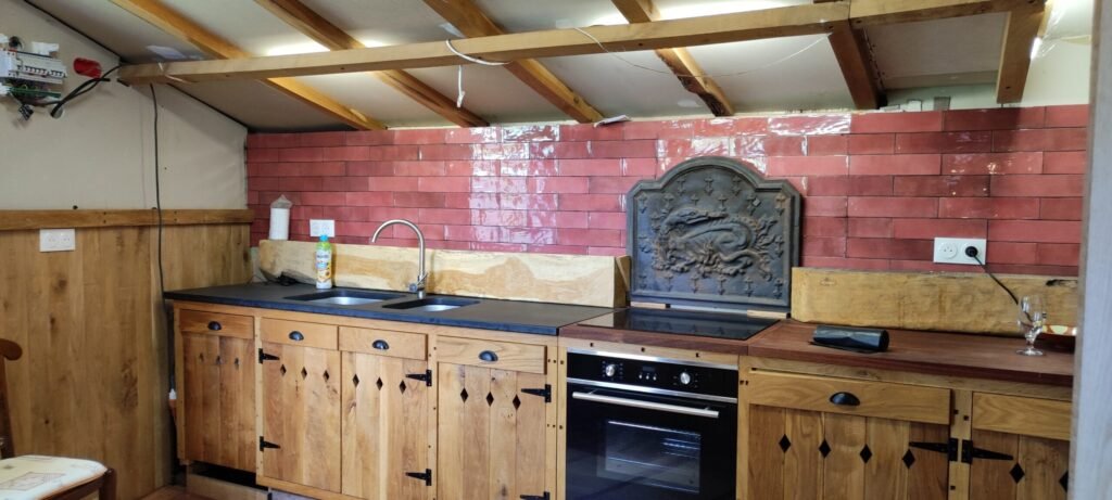 An enchanting private island chateau near Toulouse is for sale for £653,572, featuring 12 rooms, a riverside terrace, a pub, olive grove, and conversion potential.