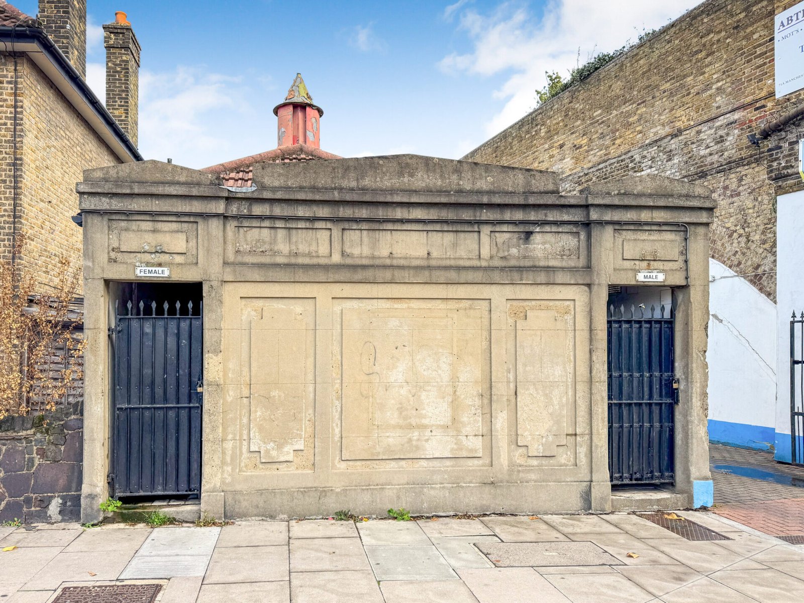 A disused public toilet on the Isle of Dogs near Canary Wharf is on sale for £110,000, offering a rare freehold plot with development potential and a spacious rear garden.