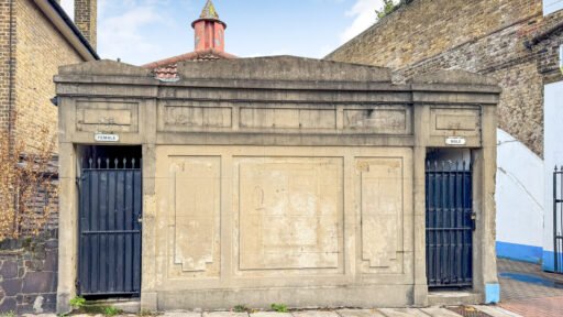 A disused public toilet on the Isle of Dogs near Canary Wharf is on sale for £110,000, offering a rare freehold plot with development potential and a spacious rear garden.