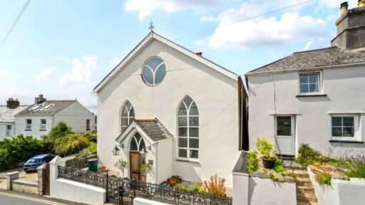 A converted chapel in Bere Alston offers heavenly charm with arched windows, an organ, and a garden called the Vicar’s Rest - listed for £450,000 by Bradleys Estate Agents.