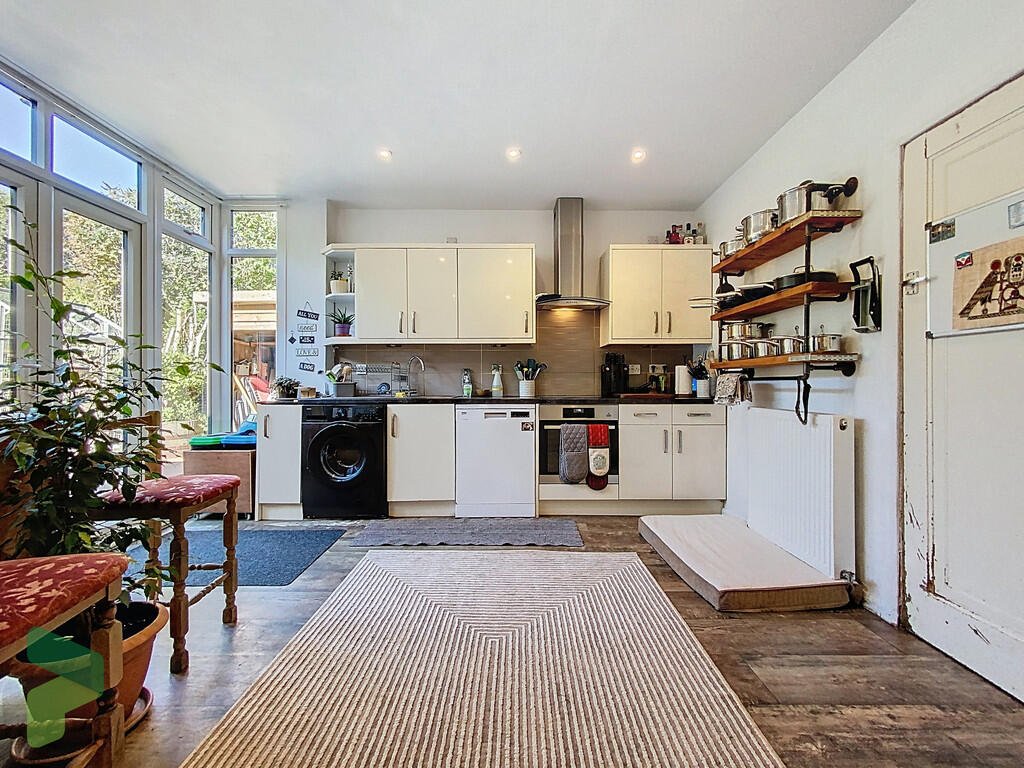 A three-bedroom home in Darwen hides a colorful secret inside – it’s a parrot paradise with bird cages, tropical plants, and even a tree at its heart, listed for £285,000.