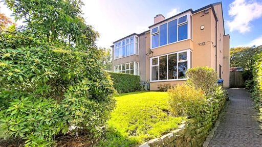 A three-bedroom home in Darwen hides a colorful secret inside – it’s a parrot paradise with bird cages, tropical plants, and even a tree at its heart, listed for £285,000.