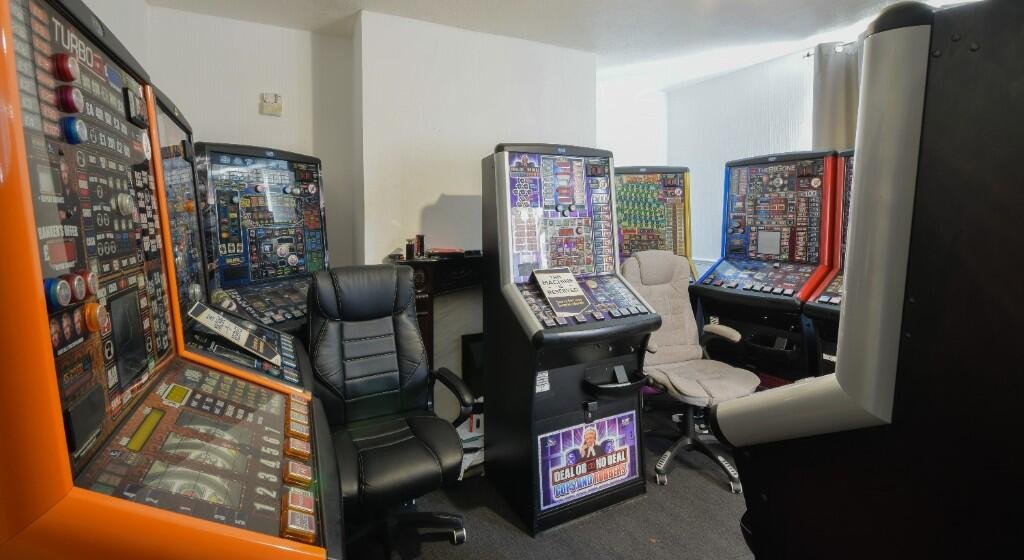 An ordinary terraced house in Washington hides a secret casino inside its living room, complete with slot machines, long-term tenants, and an annual income of £9,000.
