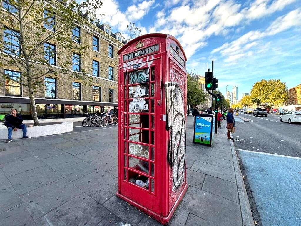 A rare red telephone box in London’s Whitechapel is up for auction from £5,000, offering a chance to own British history with potential for creative future uses.