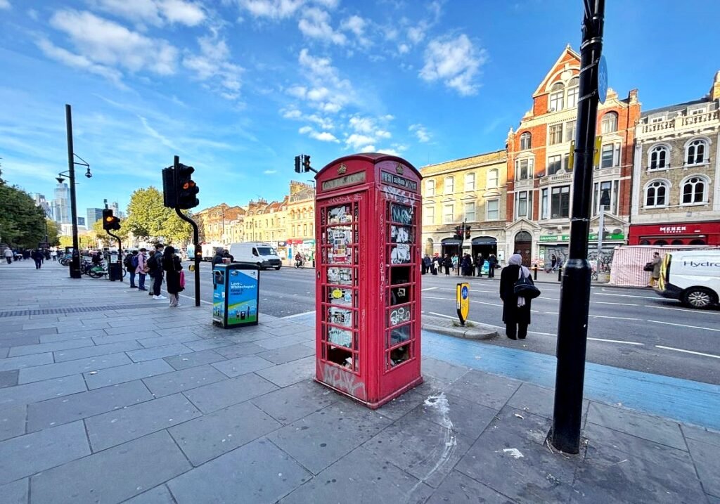 A rare red telephone box in London’s Whitechapel is up for auction from £5,000, offering a chance to own British history with potential for creative future uses.
