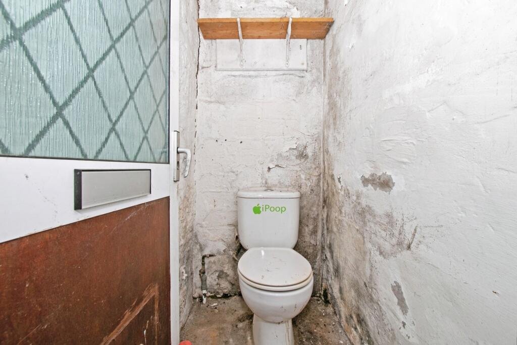 A two-bedroom cottage in Cornwall priced at £90,000 is drawing attention after photos revealed a mysterious skull on the fireplace amid its abandoned, timeworn interior.