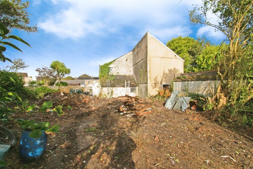 A two-bedroom cottage in Cornwall priced at £90,000 is drawing attention after photos revealed a mysterious skull on the fireplace amid its abandoned, timeworn interior.