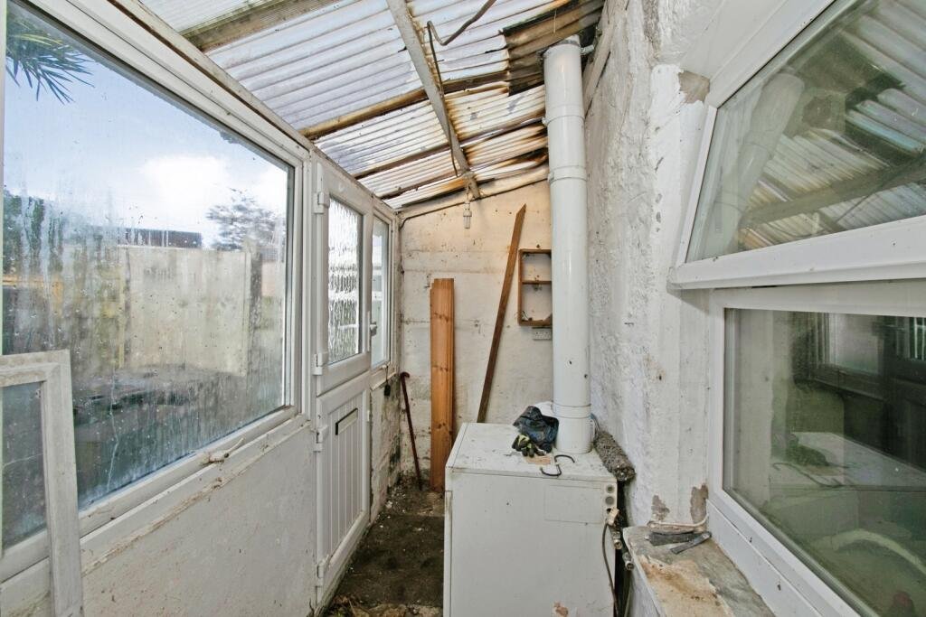 A two-bedroom cottage in Cornwall priced at £90,000 is drawing attention after photos revealed a mysterious skull on the fireplace amid its abandoned, timeworn interior.