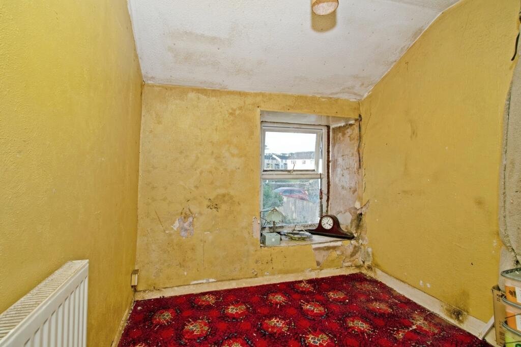 A two-bedroom cottage in Cornwall priced at £90,000 is drawing attention after photos revealed a mysterious skull on the fireplace amid its abandoned, timeworn interior.