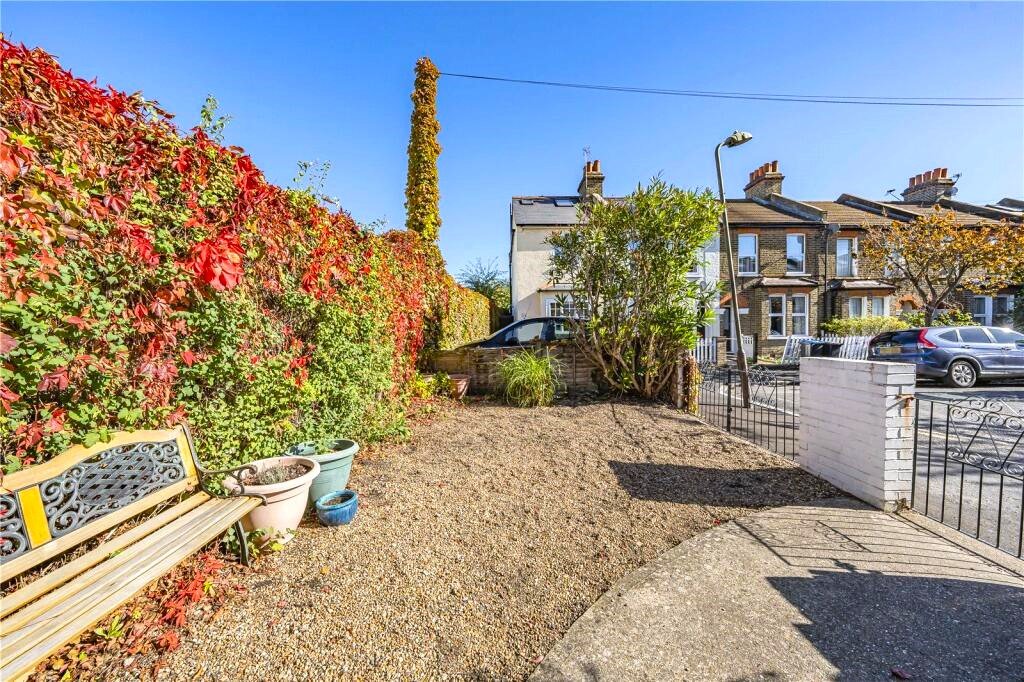 A parking space next to wheelie bins in Wimbledon is on sale for £22,500. The gated gravel spot near Wimbledon station is described as secure and priced for a quick sale.