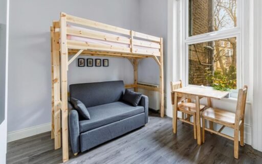 A cramped Kensington studio with a bunk bed over a sofa and a kitchenette just inches away is renting for £1,400 a month, with all bills and a £30 water charge extra.