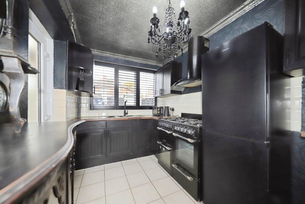 A £300,000 Bilston home has gone viral for its gothic décor featuring black walls, skulls, and a coffin used as a TV stand, offering a spooky twist on suburban living.