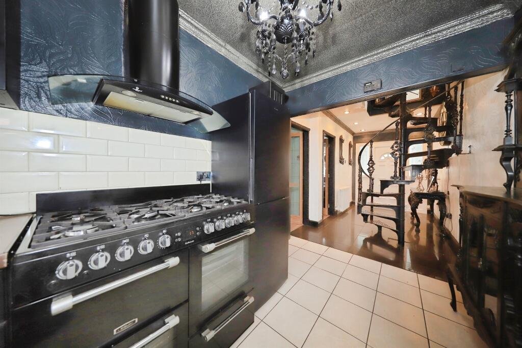 A £300,000 Bilston home has gone viral for its gothic décor featuring black walls, skulls, and a coffin used as a TV stand, offering a spooky twist on suburban living.