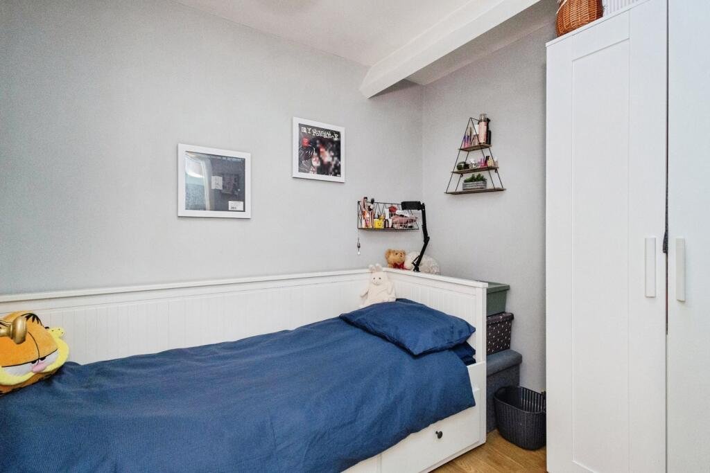 A 200 year old Rose Cottage within castle grounds in Bury is for sale at 250000 pounds offering two bedrooms cosy charm gardens parking and a unique semi rural setting today.