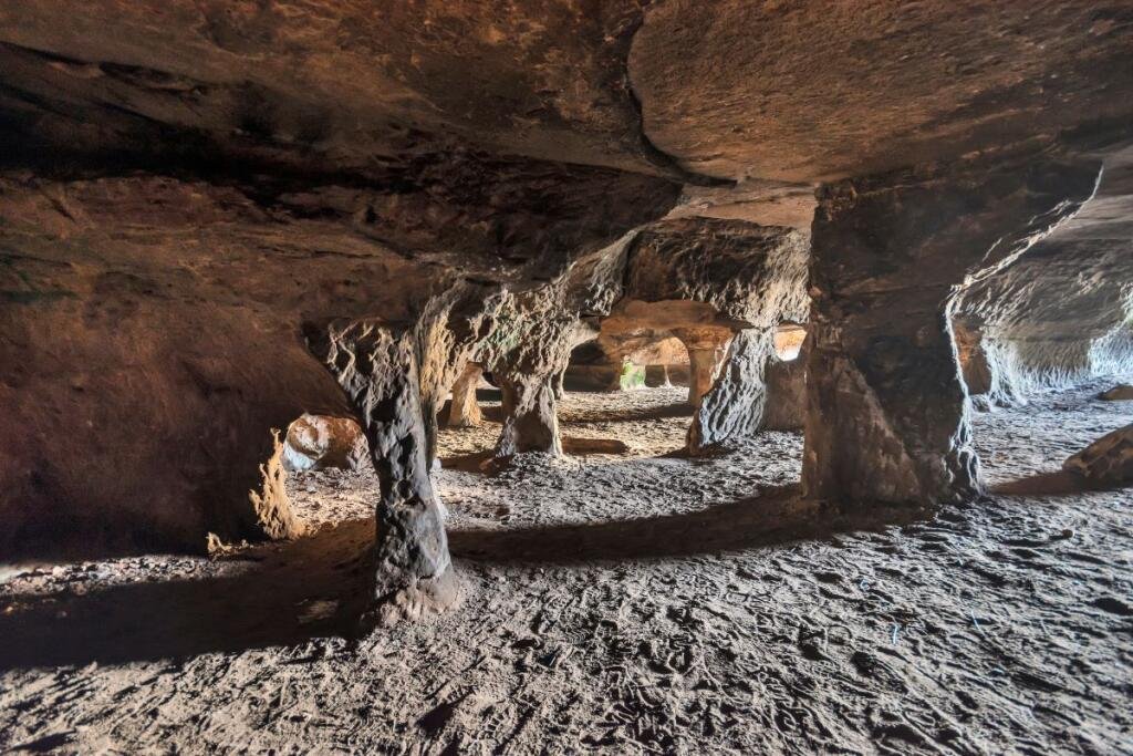 A 7.5 acre plot with hidden 500 year old Frodsham Caves is up for auction for 55000 offering a rare chance to own a mysterious underground sandstone cave network.
