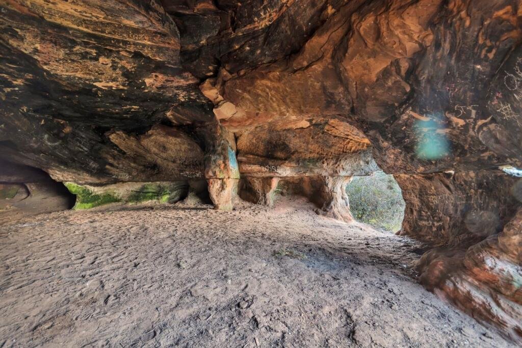 A 7.5 acre plot with hidden 500 year old Frodsham Caves is up for auction for 55000 offering a rare chance to own a mysterious underground sandstone cave network.