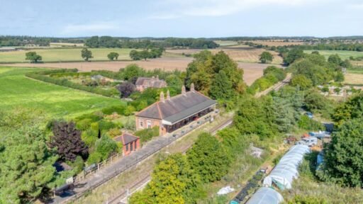 A former railway station once used by King Edward VII is for sale at £750000 offering three ensuite bedrooms original platform royal history and over an acre of landscaped grounds.