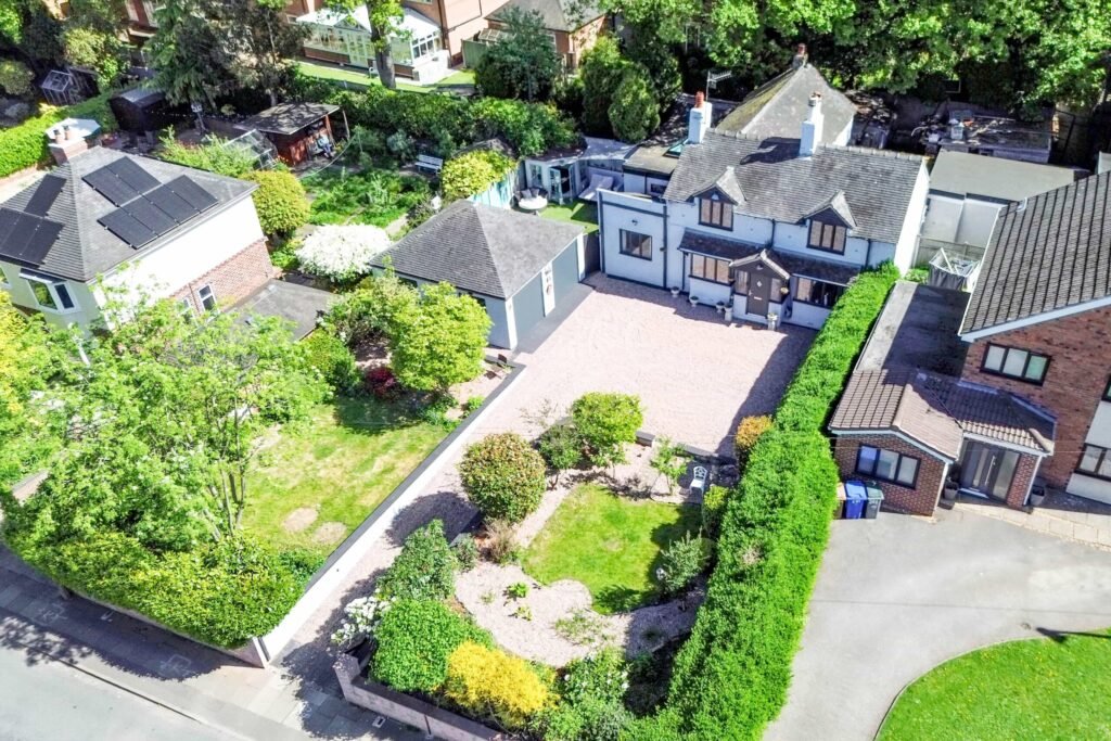 A quirky 1824 cottage in Penkhull priced at 410000 pounds features exposed beams modern spaces and a restored glass covered water well offering rare historic charm today.