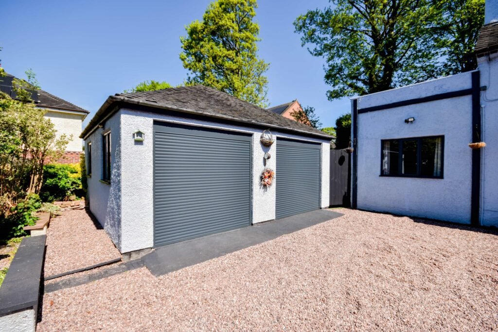 A quirky 1824 cottage in Penkhull priced at 410000 pounds features exposed beams modern spaces and a restored glass covered water well offering rare historic charm today.
