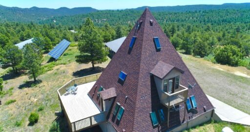 A £572,000 pyramid-shaped Colorado home with a secret bunker, escape hatch, solar power and 150 food cans is up for sale, offering complete off-grid security.