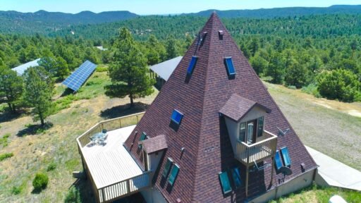 A £572,000 pyramid-shaped Colorado home with a secret bunker, escape hatch, solar power and 150 food cans is up for sale, offering complete off-grid security.