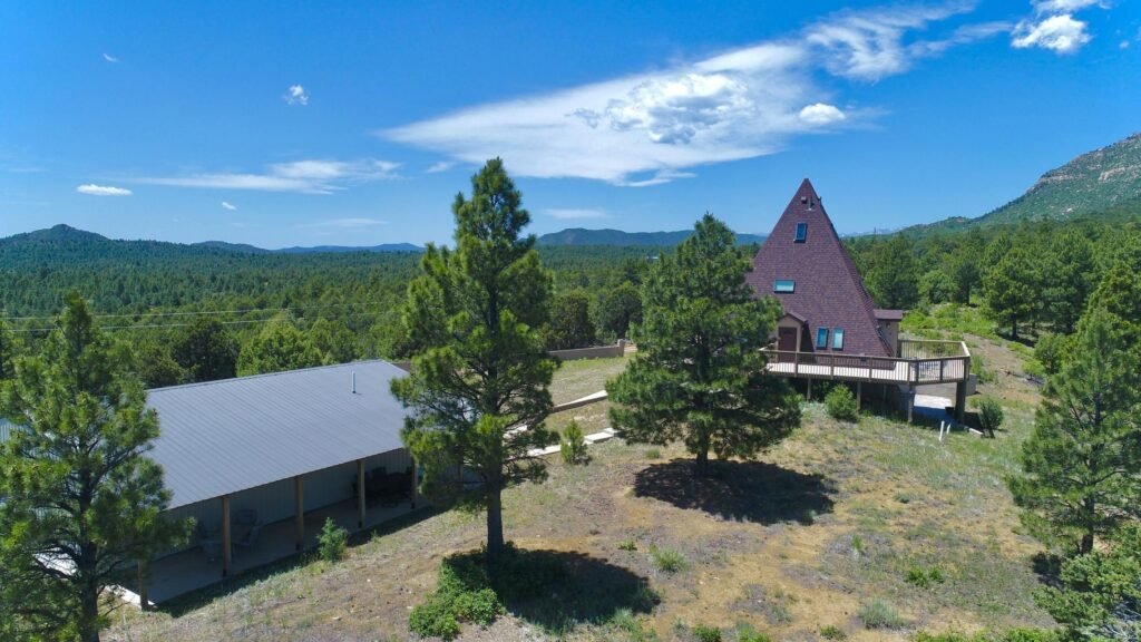 A £572,000 pyramid-shaped Colorado home with a secret bunker, escape hatch, solar power and 150 food cans is up for sale, offering complete off-grid security.