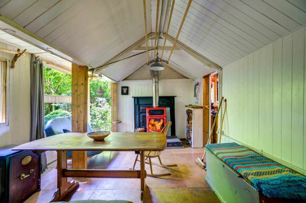 A £125,000 off-grid log cabin in Northumberland offers solar power, 5G internet and woodland views, but the new owner must move out for one week every year at Christmas.