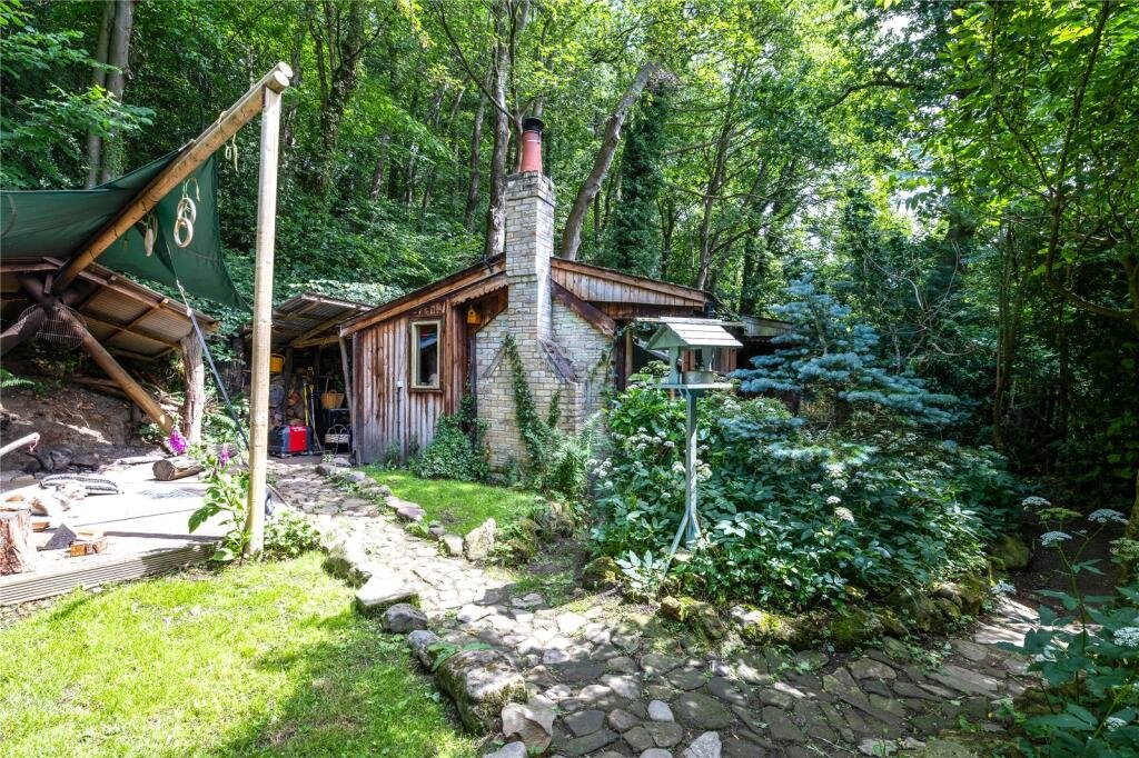 A £125,000 off-grid log cabin in Northumberland offers solar power, 5G internet and woodland views, but the new owner must move out for one week every year at Christmas.