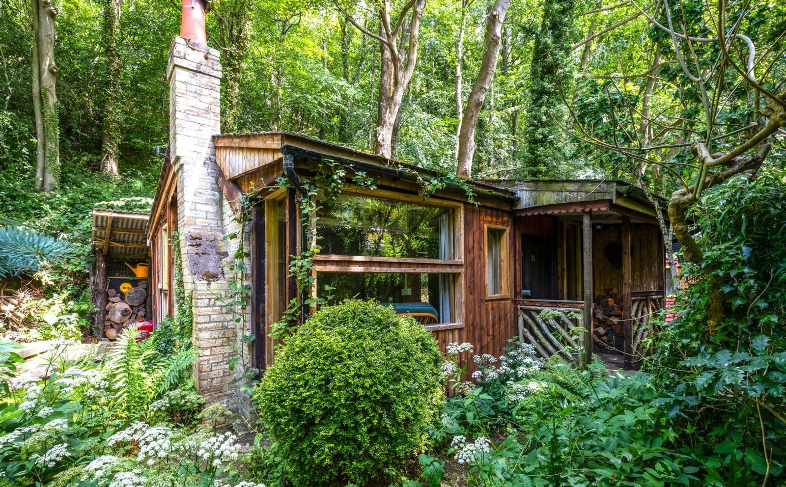 A £125,000 off-grid log cabin in Northumberland offers solar power, 5G internet and woodland views, but the new owner must move out for one week every year at Christmas.