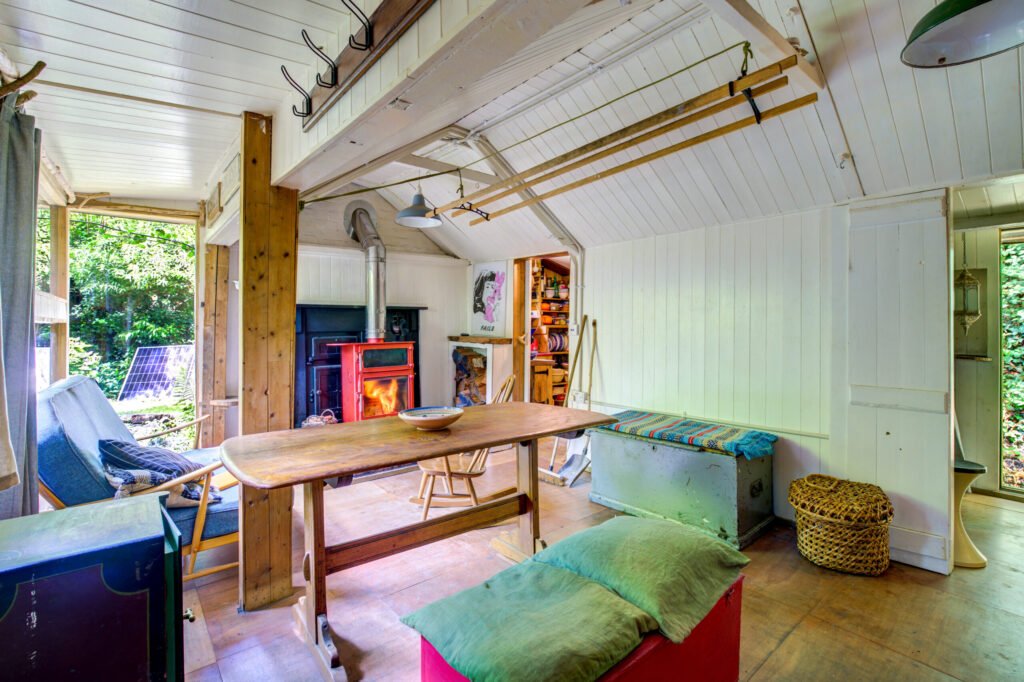 A £125,000 off-grid log cabin in Northumberland offers solar power, 5G internet and woodland views, but the new owner must move out for one week every year at Christmas.