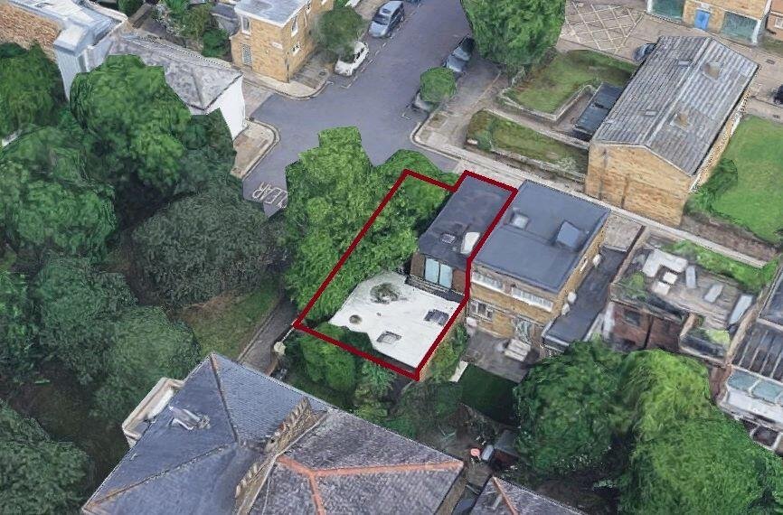 Overgrown Camden Mews home with collapsing interiors and a hidden car is listed for 925k promising redevelopment potential despite its rundown state and stunned locals.