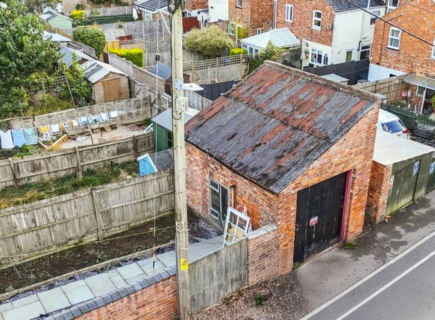 An old slaughterhouse in Daventry is up for sale at £30,000, nearly £100,000 less than its 2011 price, marketed as a unique Airbnb or rental investment opportunity.