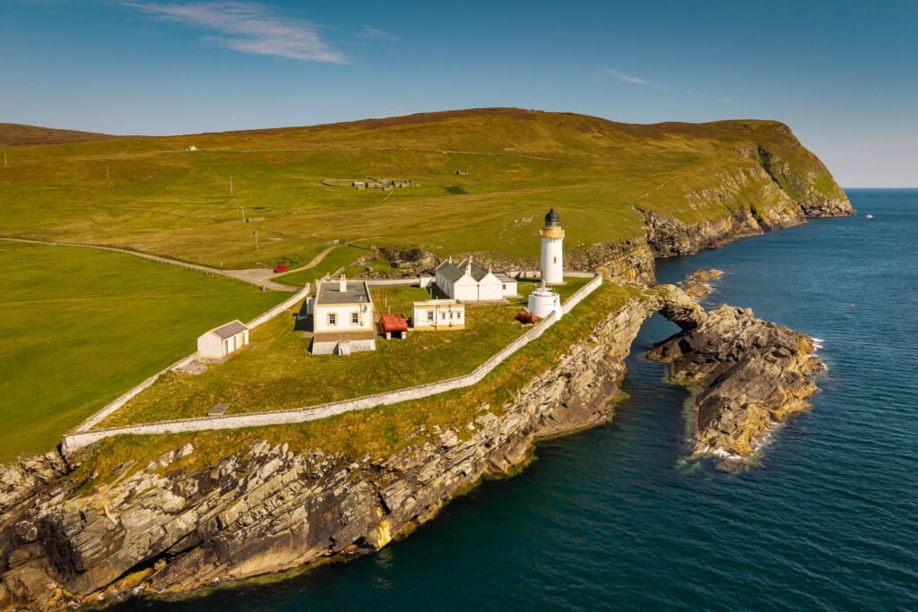 A historic seven bedroom lighthouse in Shetland is on sale for £350,000 offering sea views artist studios and former keepers cottages in a remote scenic setting.