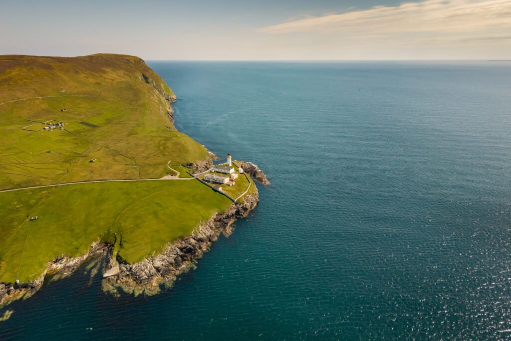 A historic seven bedroom lighthouse in Shetland is on sale for £350,000 offering sea views artist studios and former keepers cottages in a remote scenic setting.