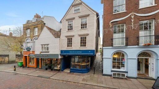 Historic 16th century Rochester wonky house hits the market for £400000 offering restored period charm original beams and a quirky slanted design plus strong Airbnb potential.