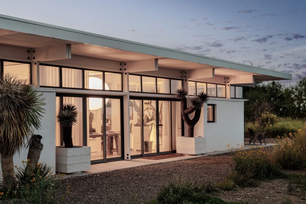 A £2.2m desert ranch near Marfa, Texas, once loved by A-listers, is for sale featuring stunning mountain views, modern design, and complete privacy on 10 acres.