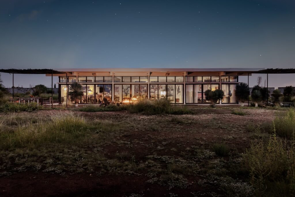 A £2.2m desert ranch near Marfa, Texas, once loved by A-listers, is for sale featuring stunning mountain views, modern design, and complete privacy on 10 acres.