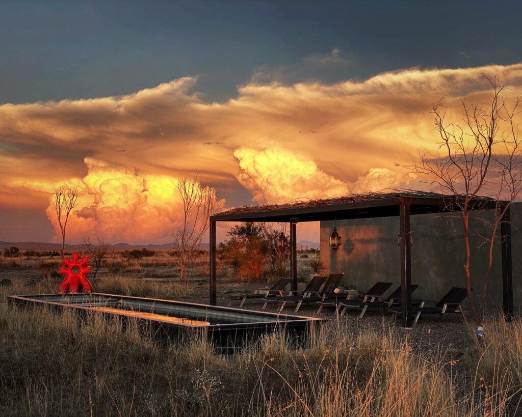 A £2.2m desert ranch near Marfa, Texas, once loved by A-listers, is for sale featuring stunning mountain views, modern design, and complete privacy on 10 acres.