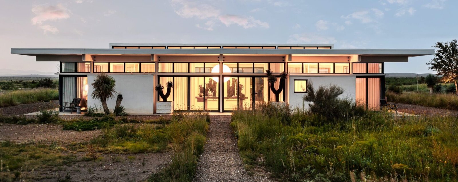 A £2.2m desert ranch near Marfa, Texas, once loved by A-listers, is for sale featuring stunning mountain views, modern design, and complete privacy on 10 acres.